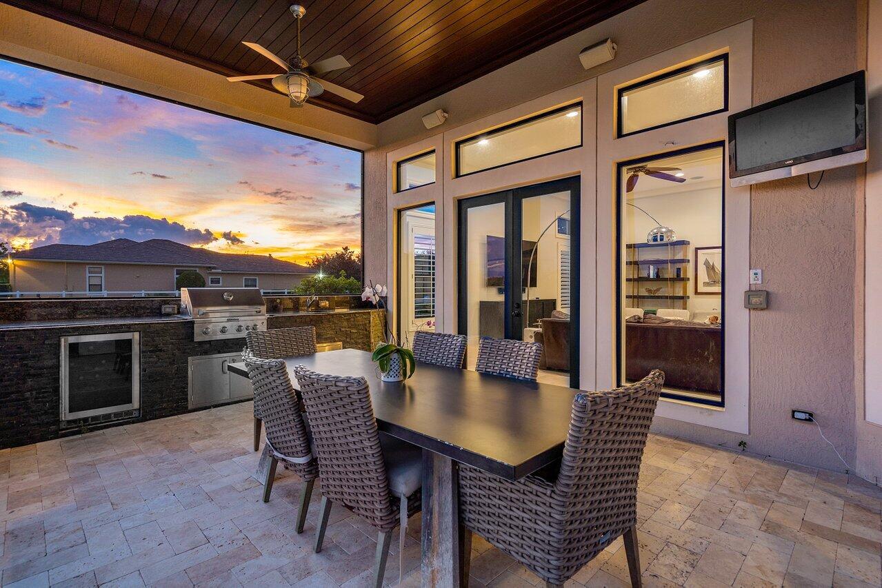 9891 Equus Circle Boynton Beach, FL 33472 - Photo 64 of 88 a view of a dining room with furniture window and wooden floor