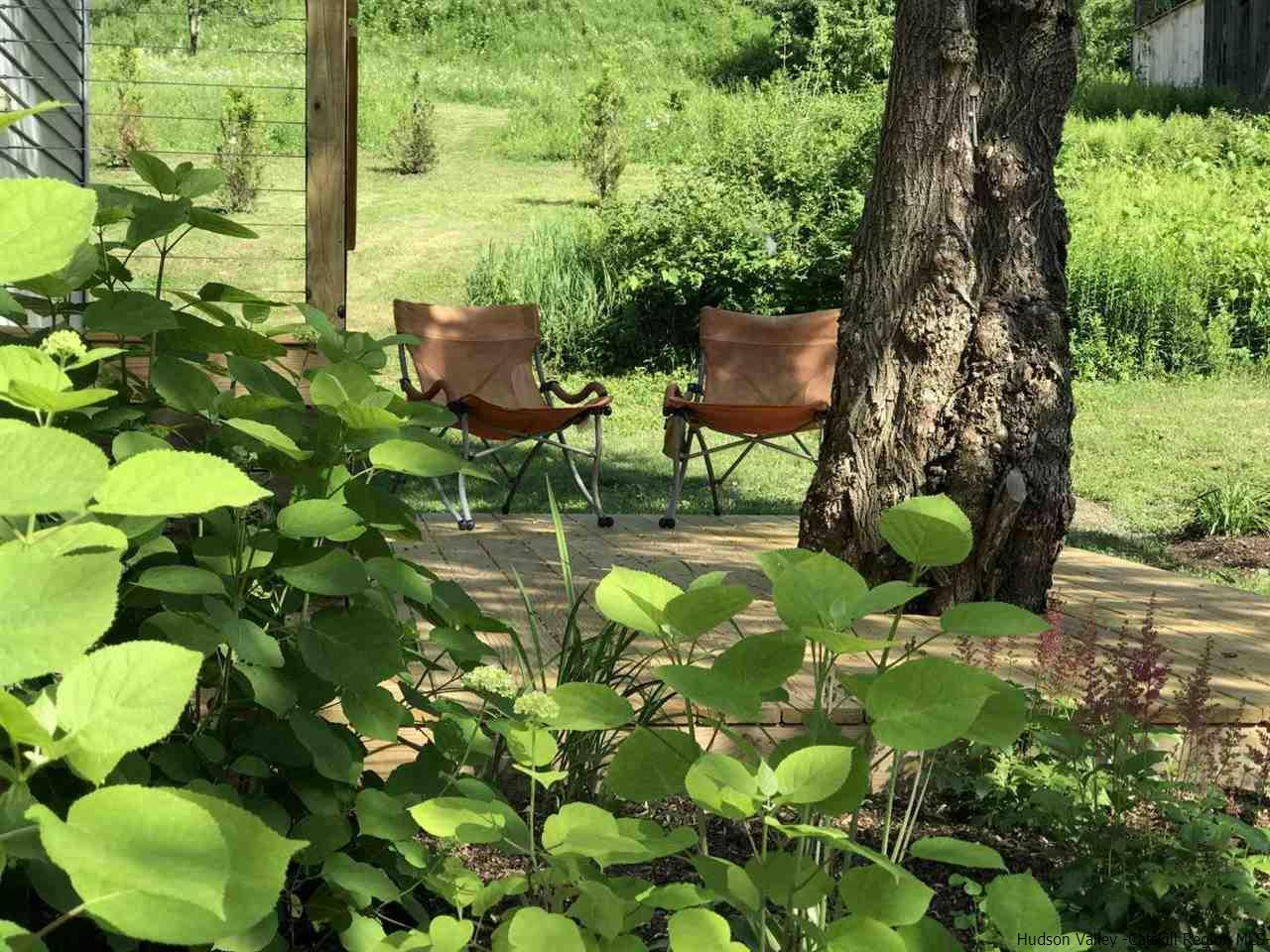 349 Co Road, Unit KRUMVILLE DAVIS CORNER RD Olivebridge, NY 12461 - Photo 18 of 25 a view of a bunch of flowers in a garden