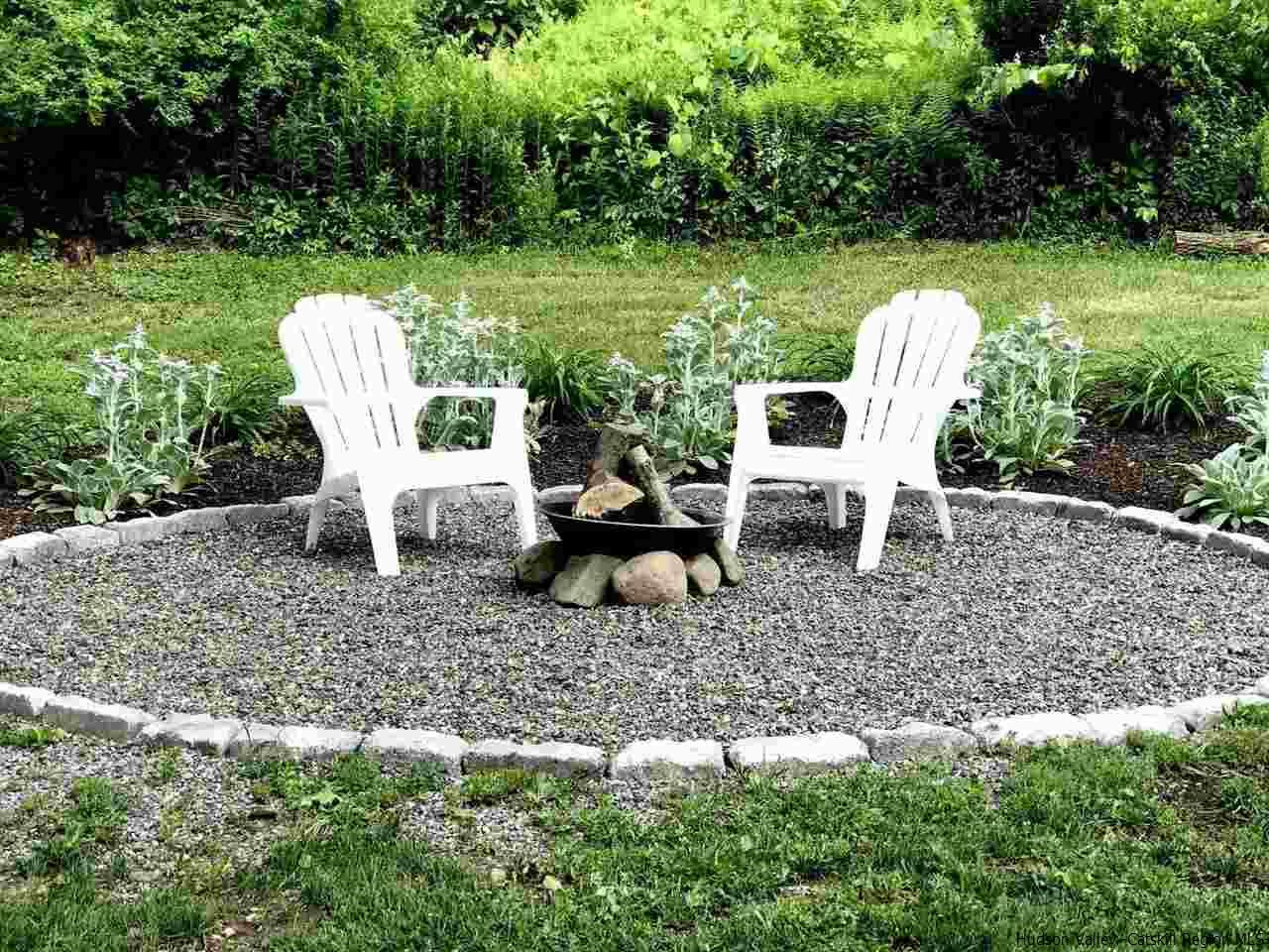 349 Co Road, Unit KRUMVILLE DAVIS CORNER RD Olivebridge, NY 12461 - Photo 20 of 25 a view of a table and chairs in the garden