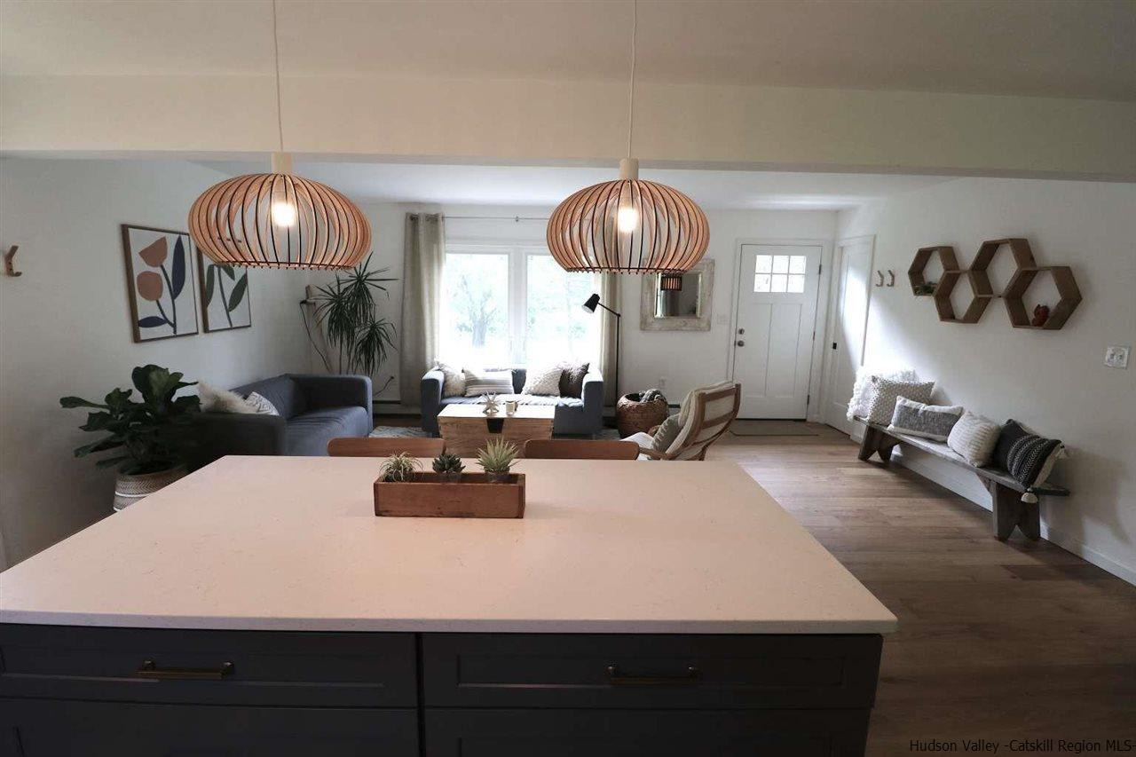 349 Co Road, Unit KRUMVILLE DAVIS CORNER RD Olivebridge, NY 12461 - Photo 8 of 25 a large white kitchen with a large island