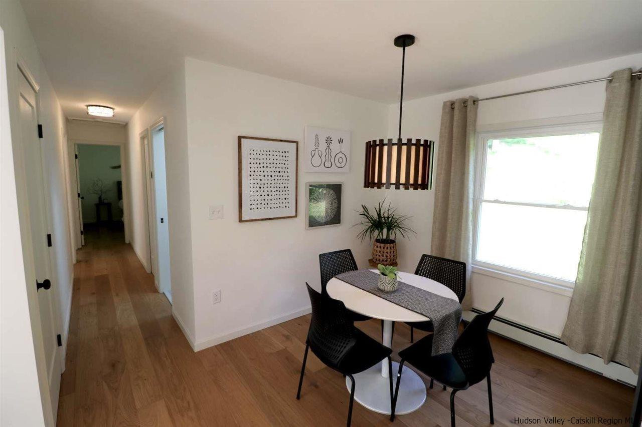 349 Co Road, Unit KRUMVILLE DAVIS CORNER RD Olivebridge, NY 12461 - Photo 10 of 25 a view of a room with furniture window and wooden floor