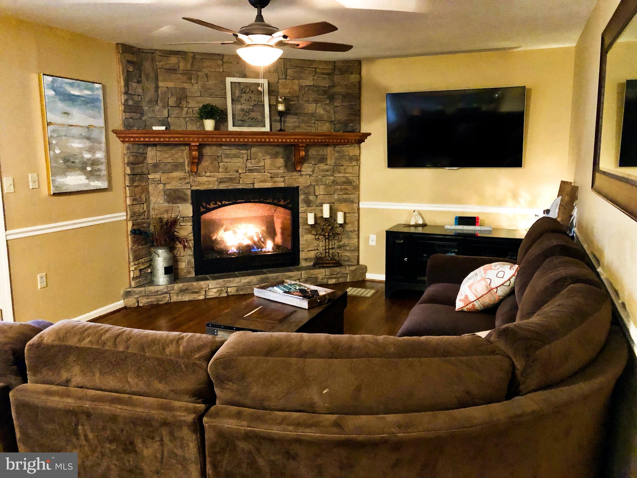 4305 Zircon Road Middletown, MD 21769 - Photo 11 of 38 Cozy family room with fireplace
