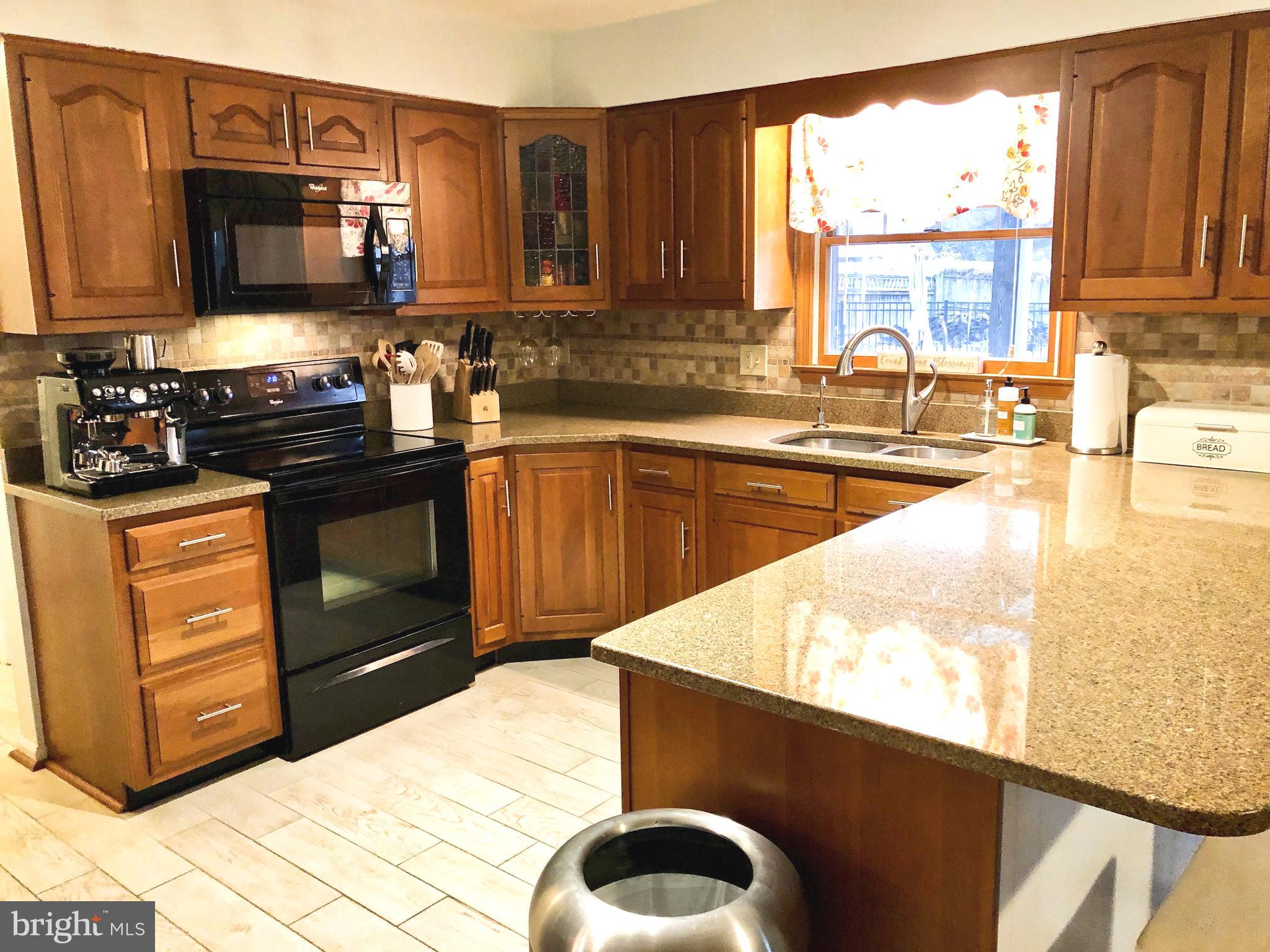 4305 Zircon Road Middletown, MD 21769 - Photo 5 of 38 Open kitchen with granite counters