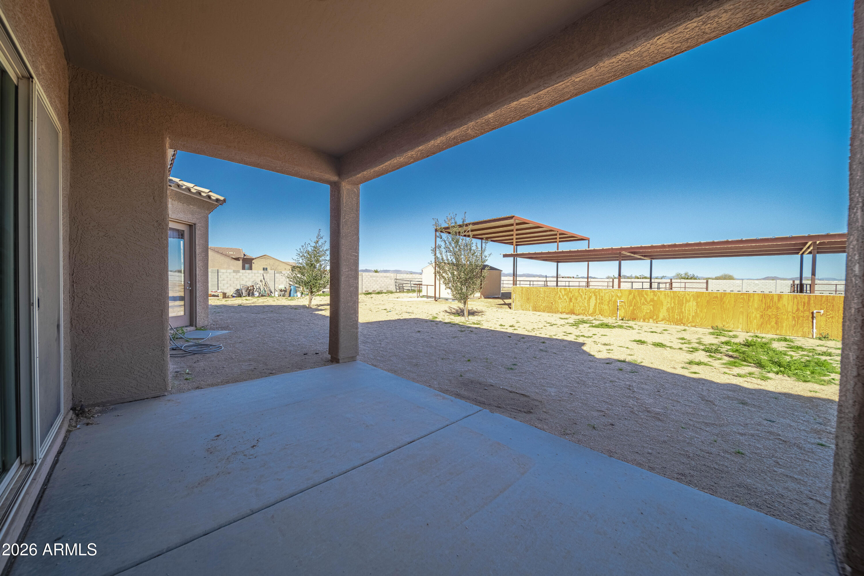 28621 North Bush Street Wittmann, AZ 85361 - Photo 13 of 41 a view of an empty room and a window