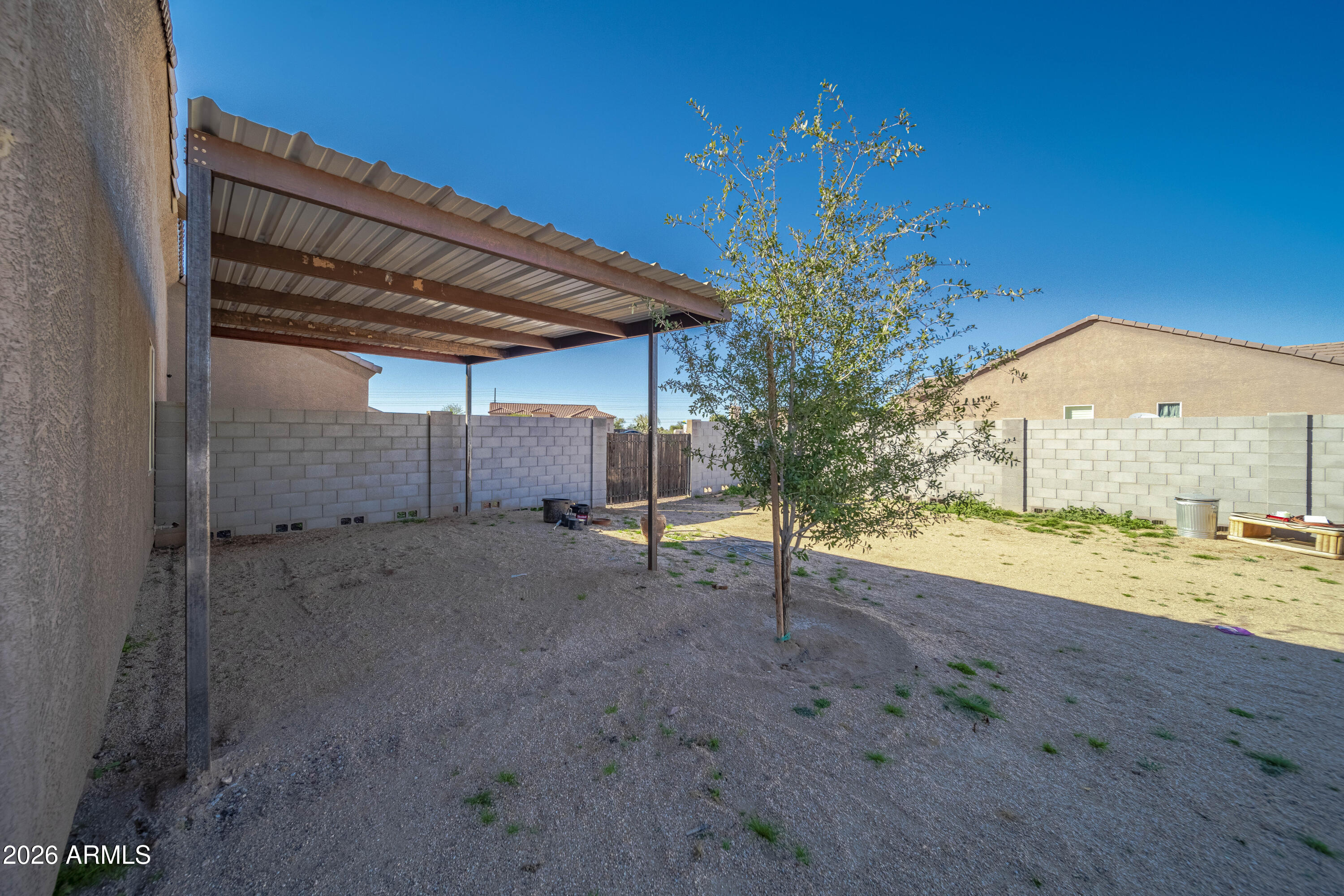 28621 North Bush Street Wittmann, AZ 85361 - Photo 14 of 41 a view of a room with wooden floor
