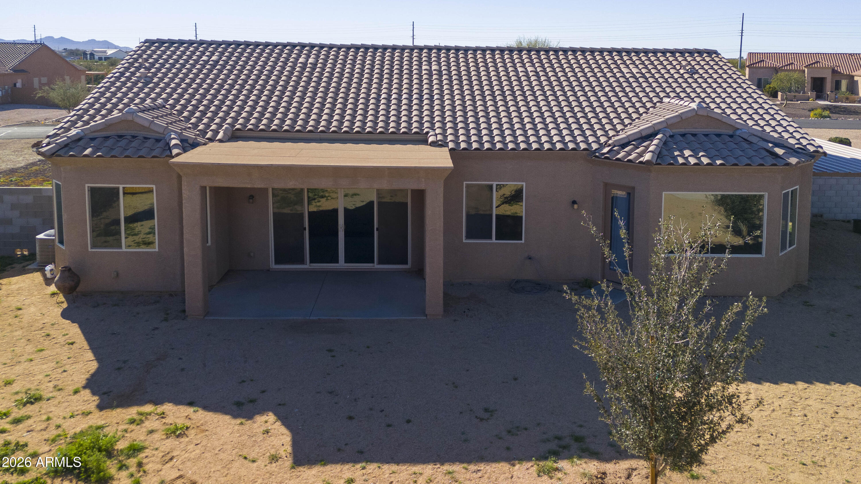 28621 North Bush Street Wittmann, AZ 85361 - Photo 2 of 41 a front view of a house