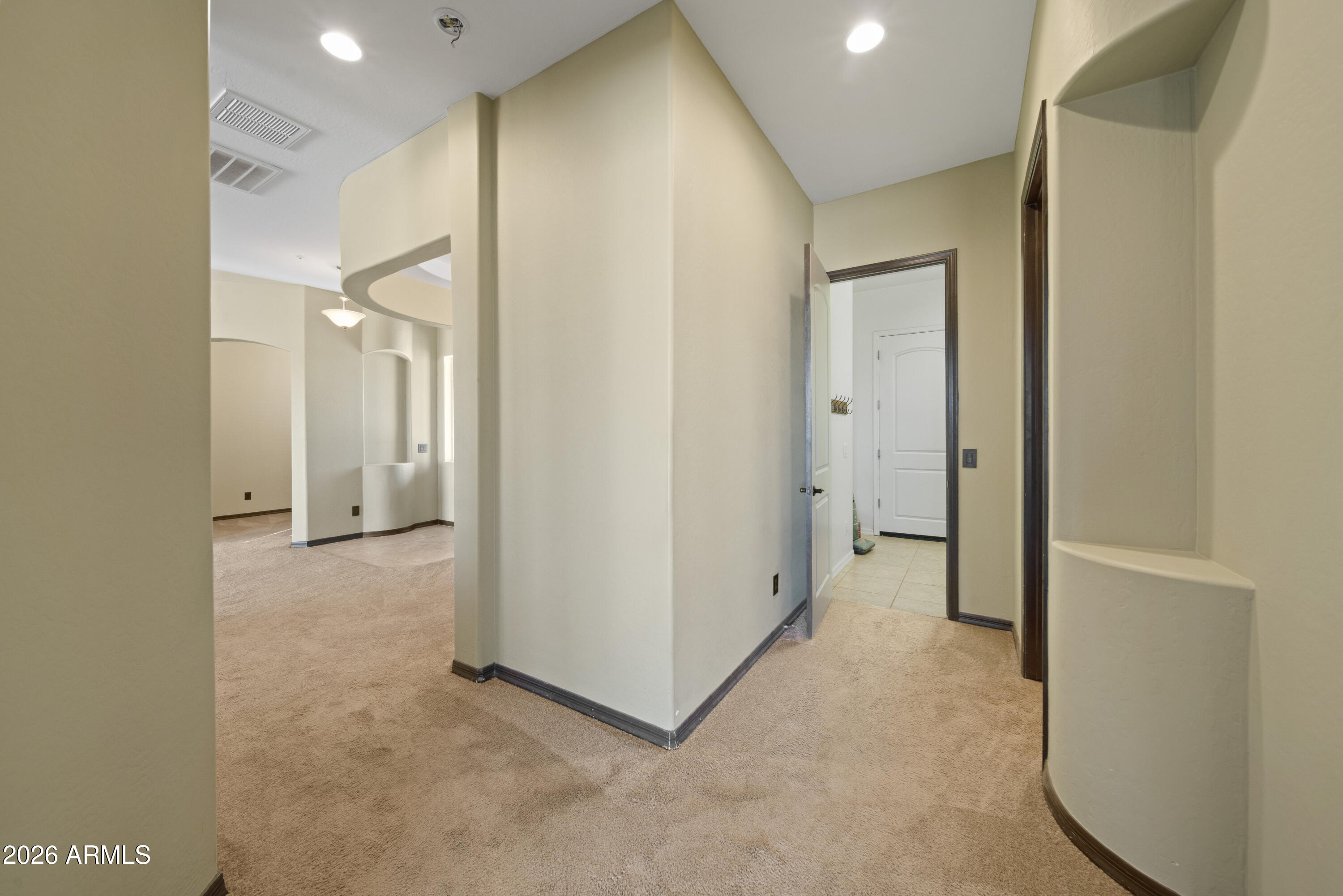 28621 North Bush Street Wittmann, AZ 85361 - Photo 35 of 41 a view of a hallway with a room