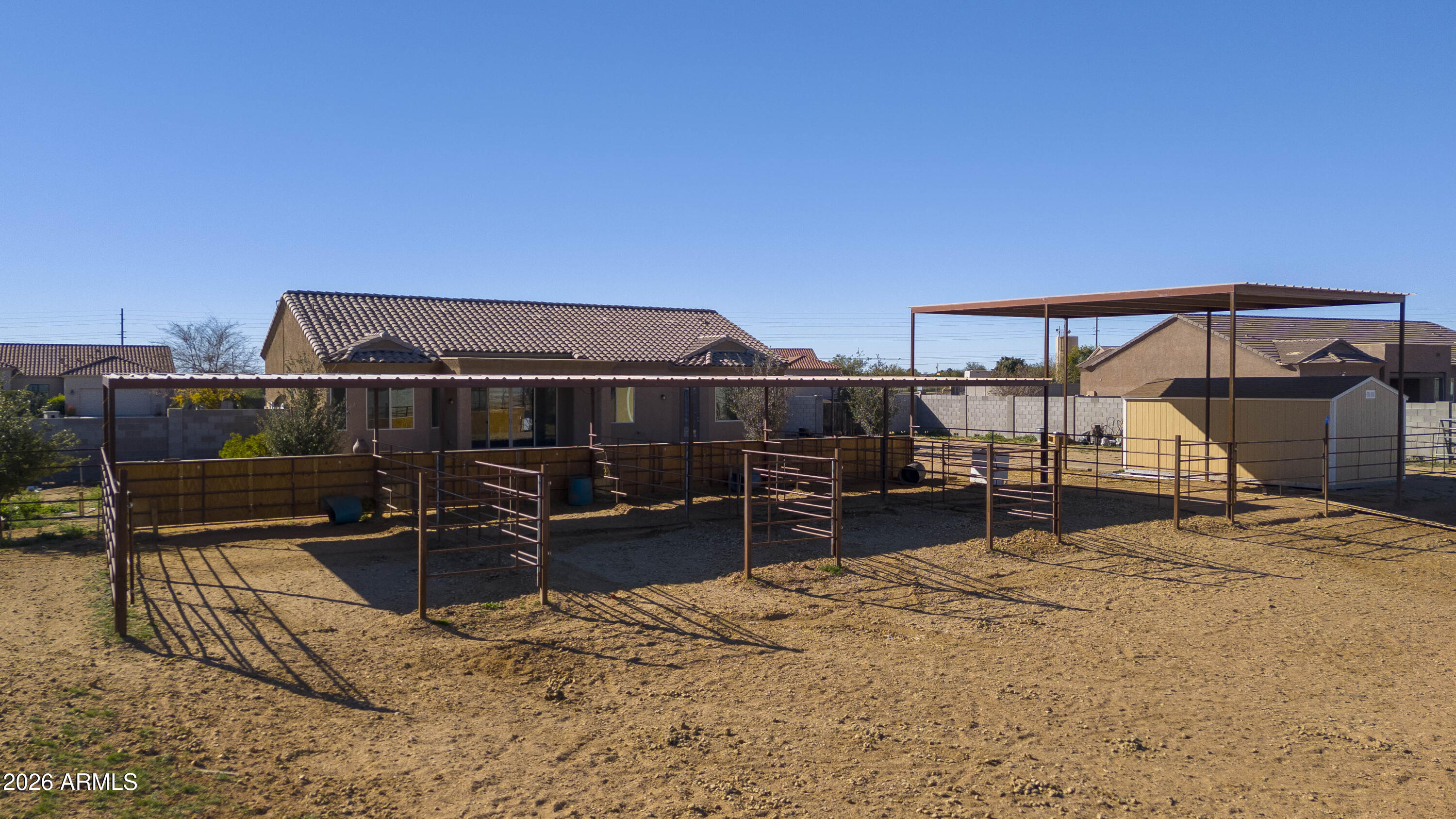 28621 North Bush Street Wittmann, AZ 85361 - Photo 4 of 41 a view of a roof deck with wooden fence