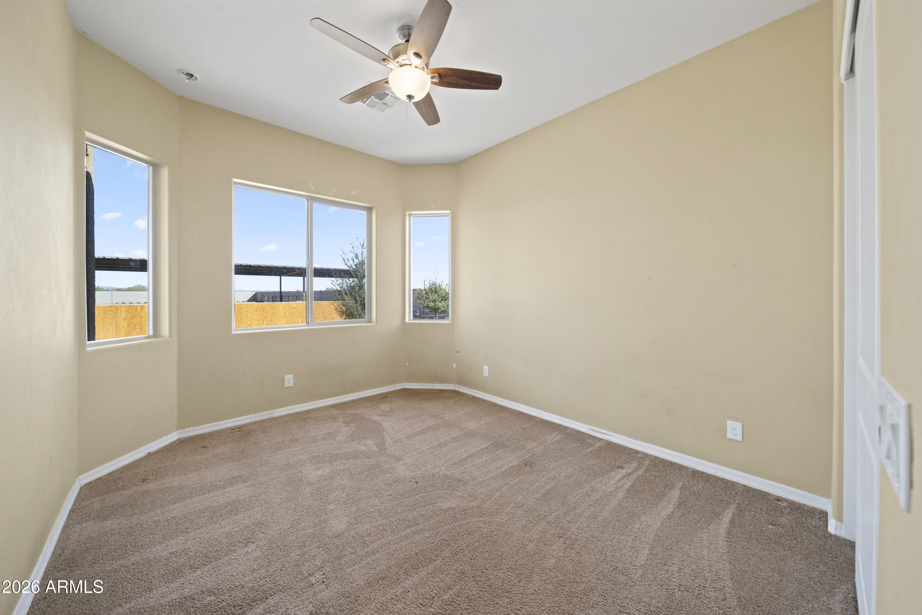 28621 North Bush Street Wittmann, AZ 85361 - Photo 41 of 41 a view of an empty room with a window