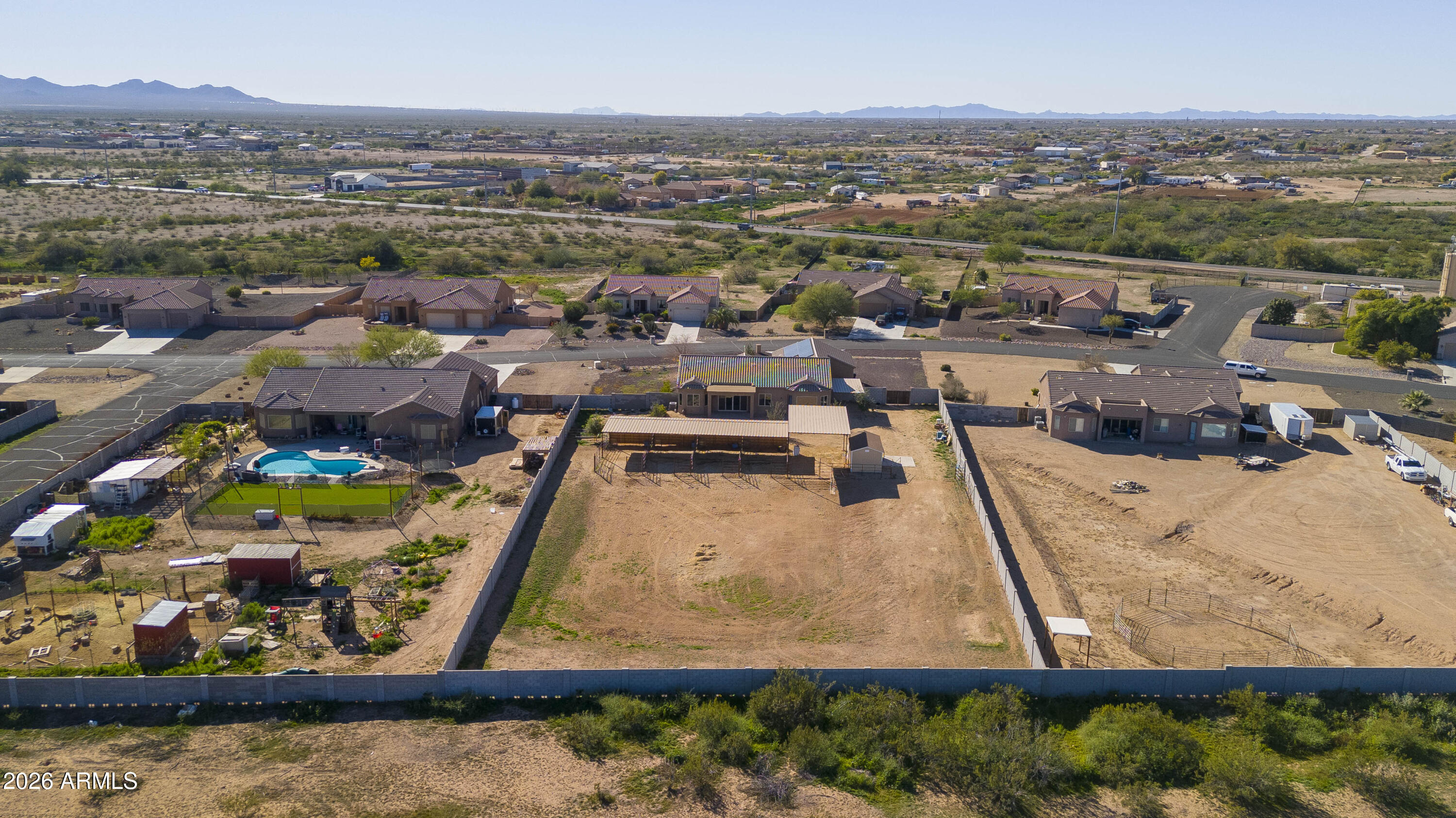 28621 North Bush Street Wittmann, AZ 85361 - Photo 6 of 41 an aerial view of a pool and outdoor space