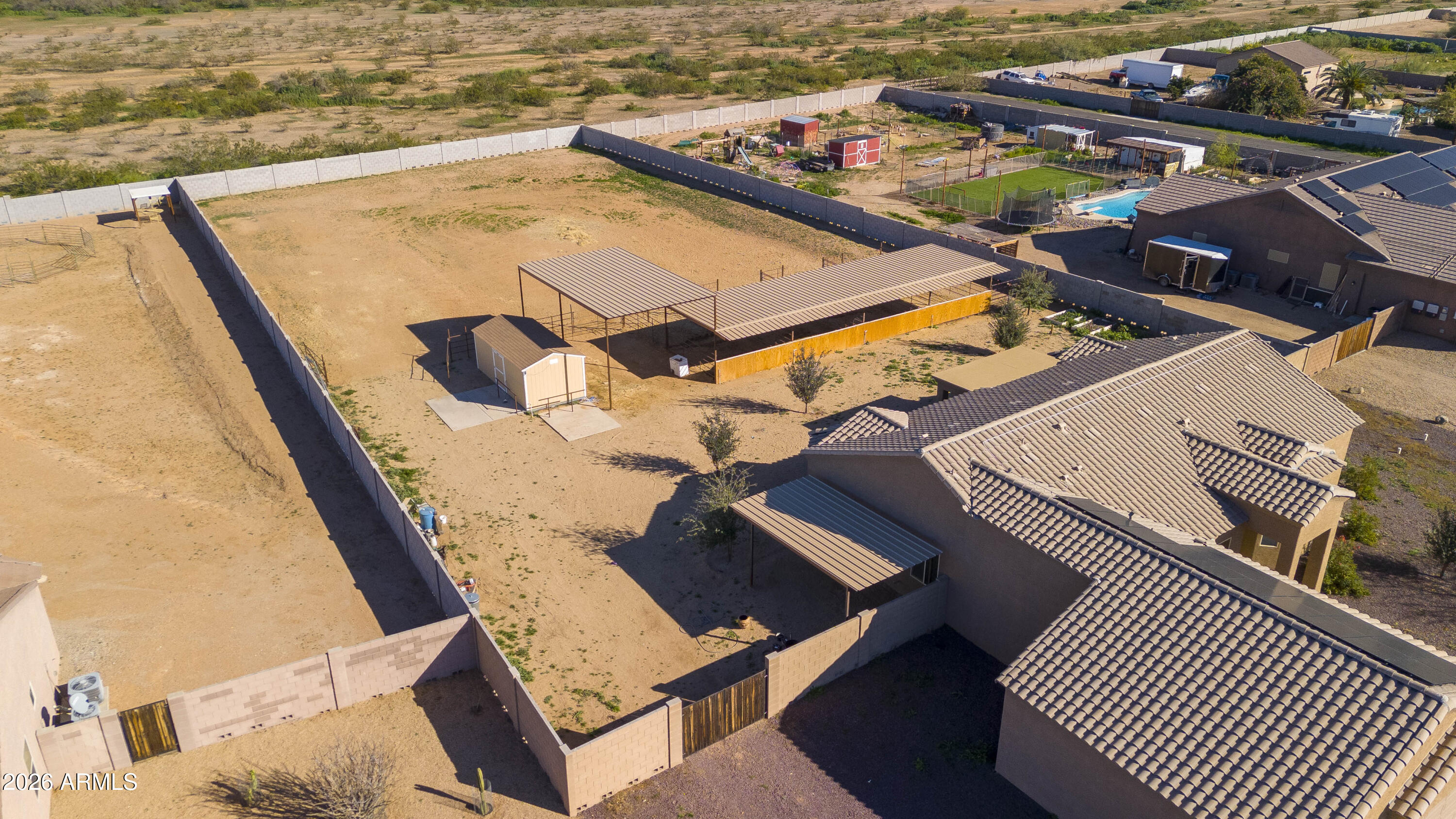 28621 North Bush Street Wittmann, AZ 85361 - Photo 9 of 41 an aerial view of a house with outdoor space