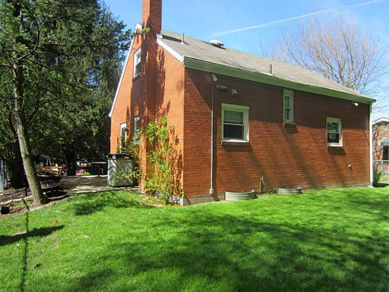 3492 Evergreen Road Pittsburgh, PA 15237 - Photo 5 of 24 Exterior Back. All brick back with lots of green grass on level back yard -- back yard has no visible site of any house behind