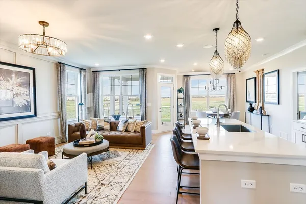 a very nice looking living room with a large window