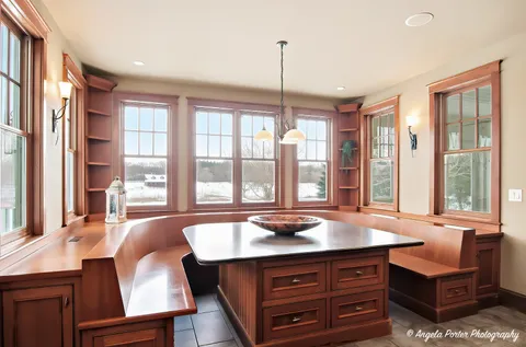 a kitchen with a refrigerator and a sink