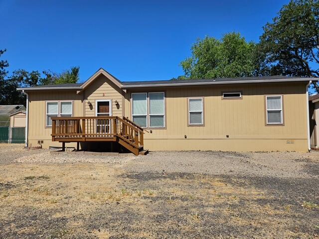 225 Wilson Road Central Point, OR 97502 - Photo 26 of 76 a view of a house with a yard