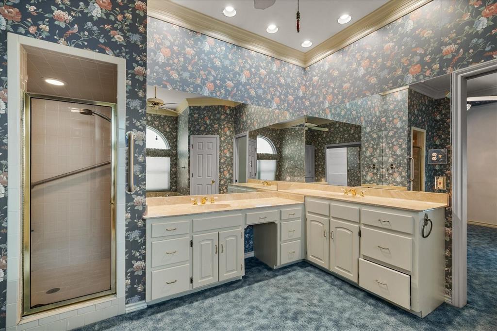9 Willow Ridge Road Greenville, TX 75402 - Photo 17 of 31 Full bath featuring wallpapered walls, a stall shower, vanity, a ceiling fan, and crown molding