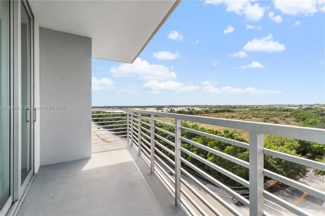 a view of a balcony with city view