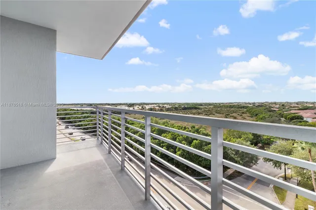 a view of a balcony with an ocean view