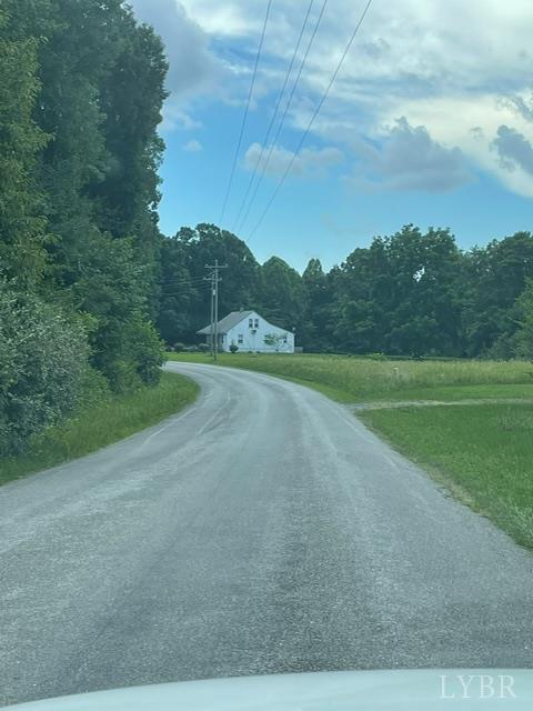 Undisclosed Address Gladys, VA 24554 - Photo 3 of 3 a view of a field with an trees