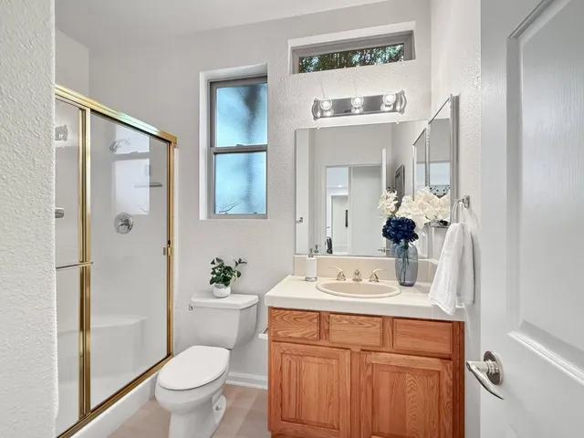 a bed room with a bed and a window