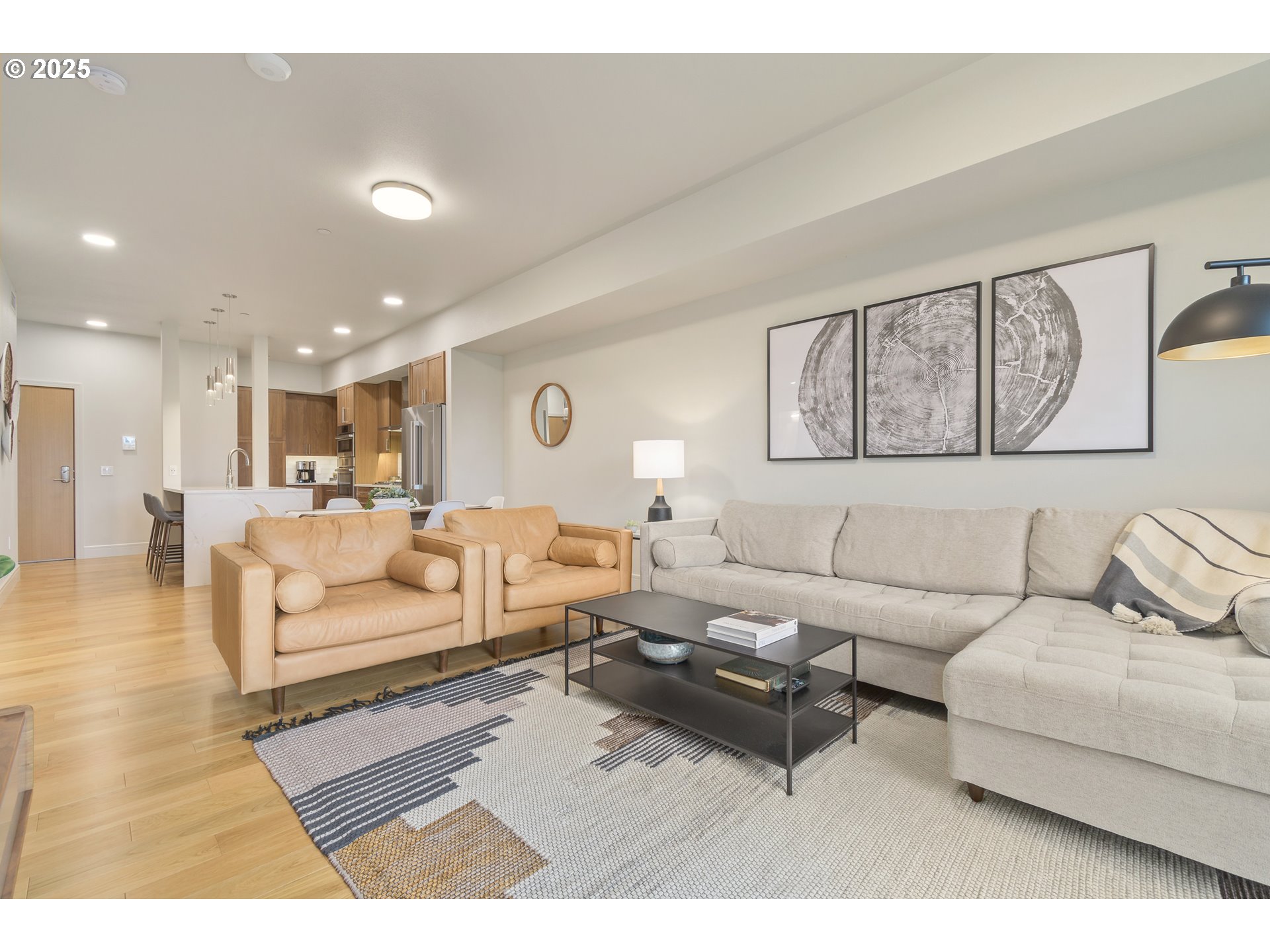 1600 Pearl Street, Unit 305 Eugene, OR 97401 - Photo 19 of 46 a living room with furniture and view of kitchen