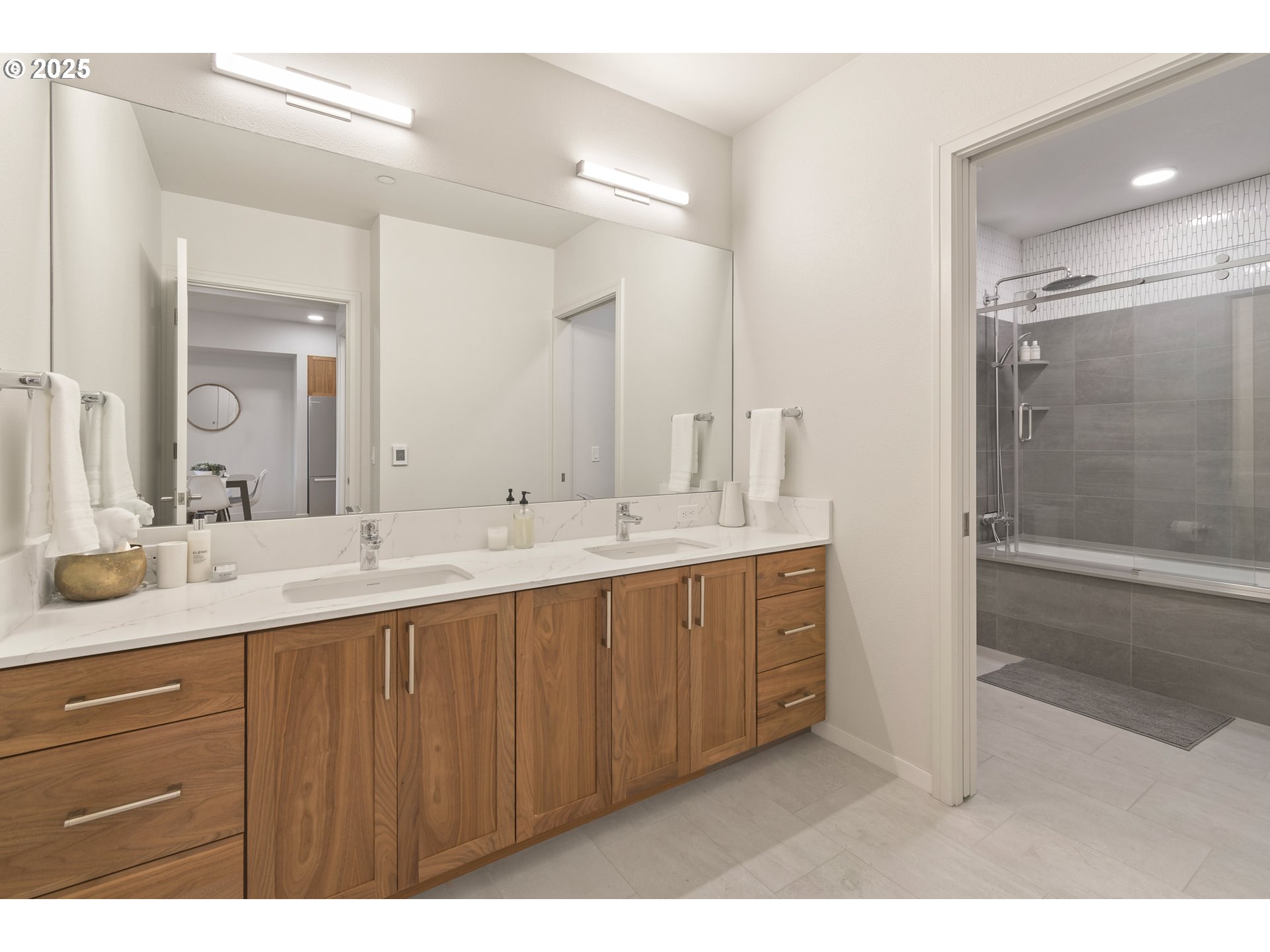 1600 Pearl Street, Unit 305 Eugene, OR 97401 - Photo 27 of 46 a bathroom with a double vanity sink mirror and double