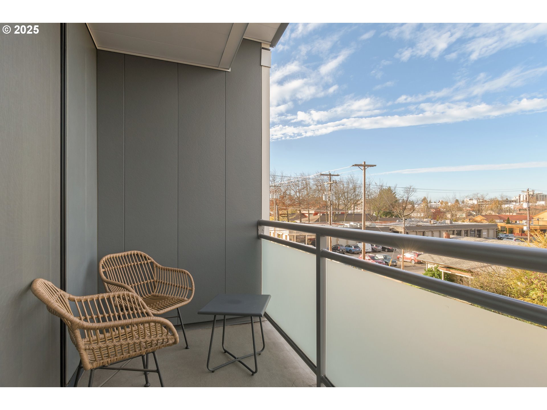 1600 Pearl Street, Unit 305 Eugene, OR 97401 - Photo 33 of 46 a balcony with table and chairs