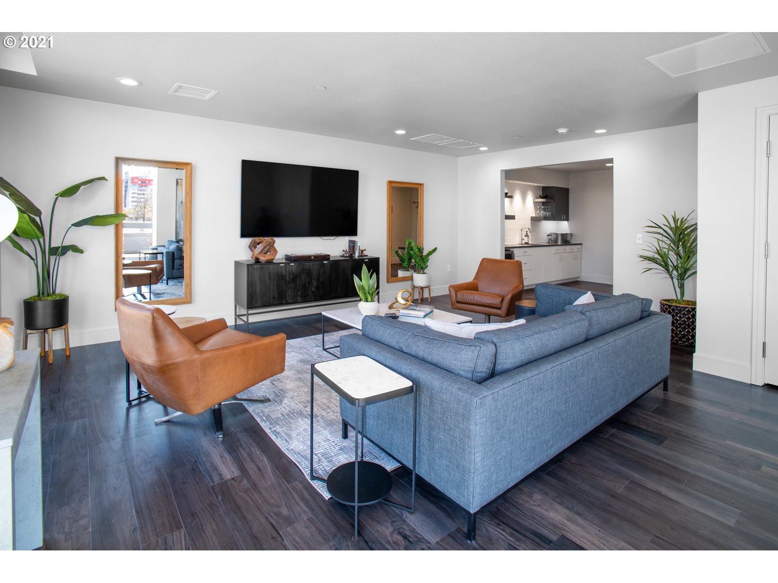 1600 Pearl Street, Unit 305 Eugene, OR 97401 - Photo 36 of 46 a living room with furniture and a flat screen tv