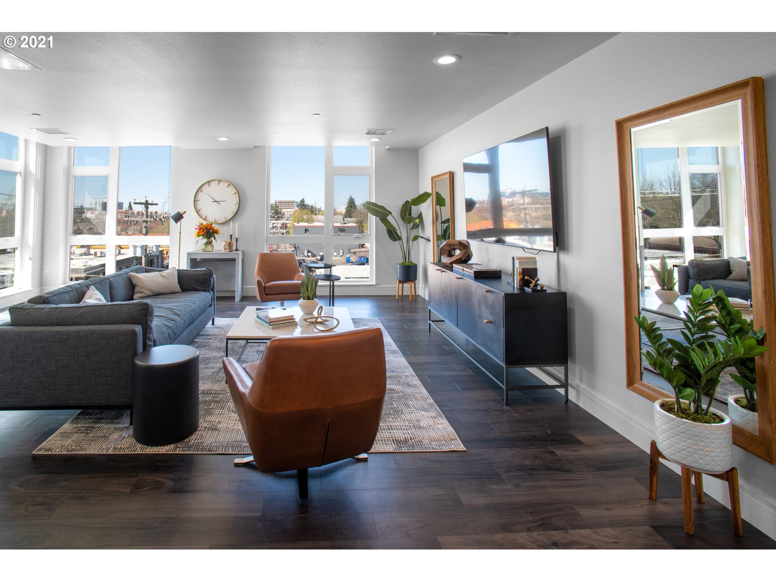 1600 Pearl Street, Unit 305 Eugene, OR 97401 - Photo 37 of 46 a living room with furniture potted plant and kitchen view