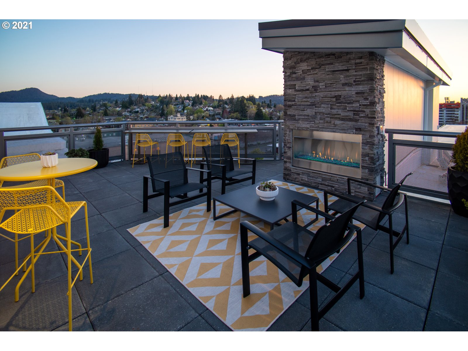 1600 Pearl Street, Unit 305 Eugene, OR 97401 - Photo 42 of 46 a terrace of a house with outdoor seating