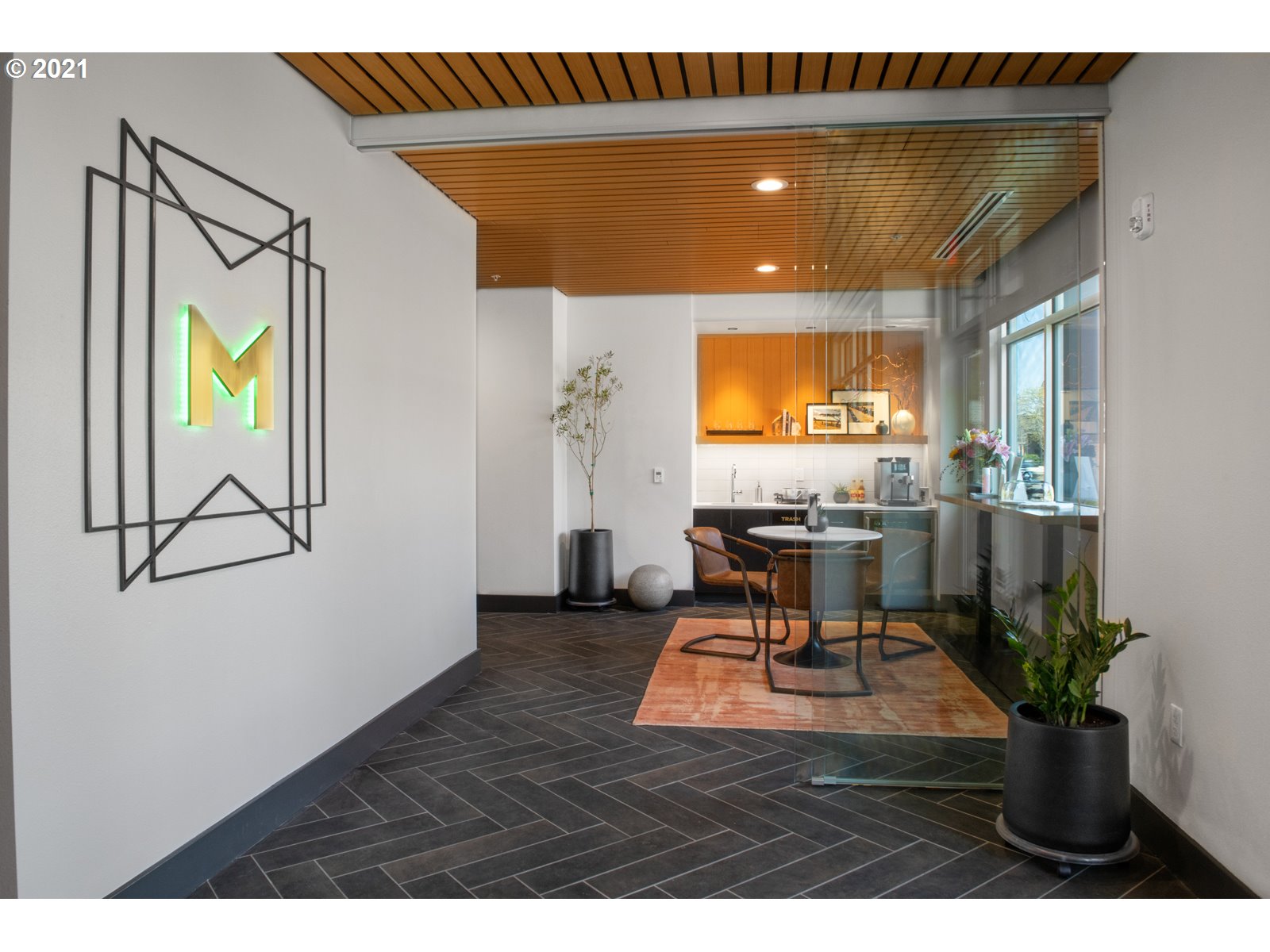 1600 Pearl Street, Unit 305 Eugene, OR 97401 - Photo 5 of 46 a living room with furniture and a flat screen tv