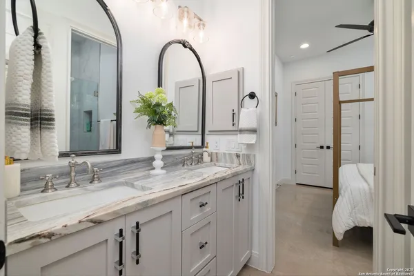 a bathroom with a shower and toilet