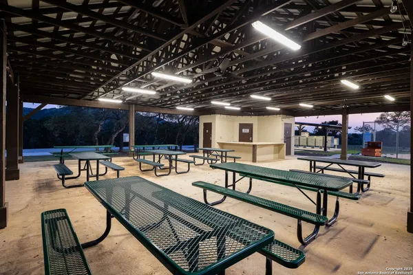 a view of a sign board with yard