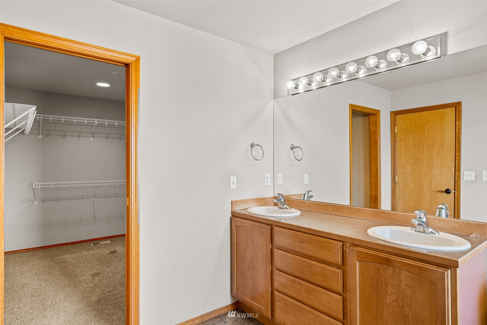 2448 Harvester Loop East Wenatchee, WA 98802 - Photo 16 of 28 a bathroom with a granite countertop sink mirror and double
