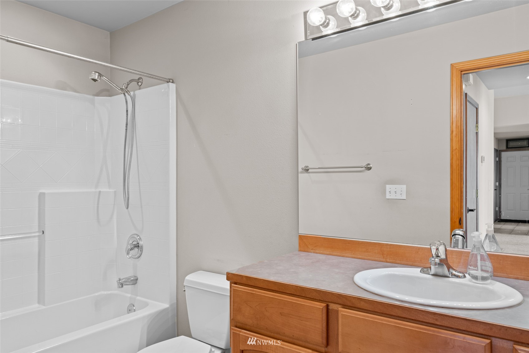 2448 Harvester Loop East Wenatchee, WA 98802 - Photo 18 of 28 a bathroom with a sink and a mirror