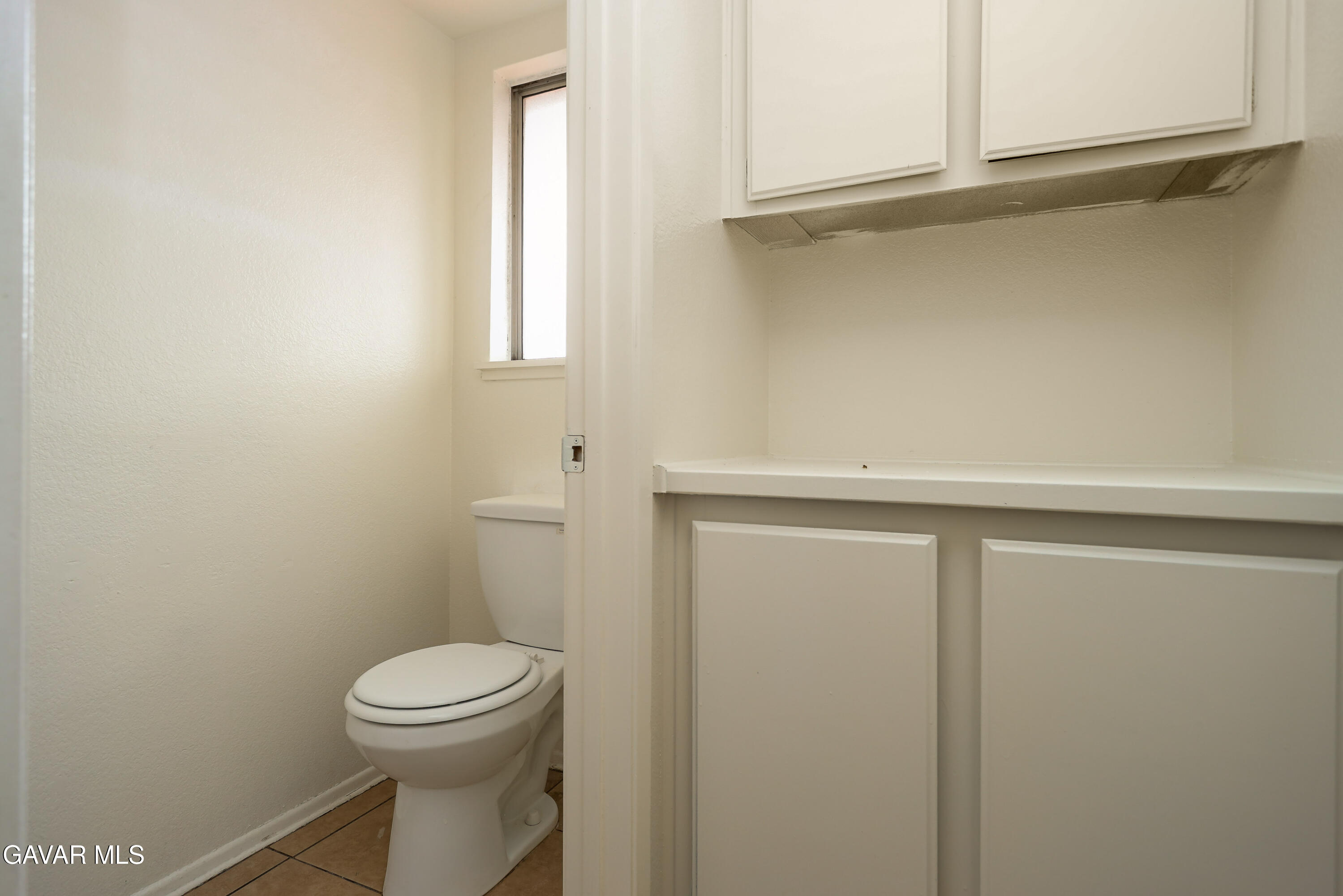 5217 East Ave R 4 Palmdale, CA 93552 - Photo 24 of 33 a bathroom with a toilet