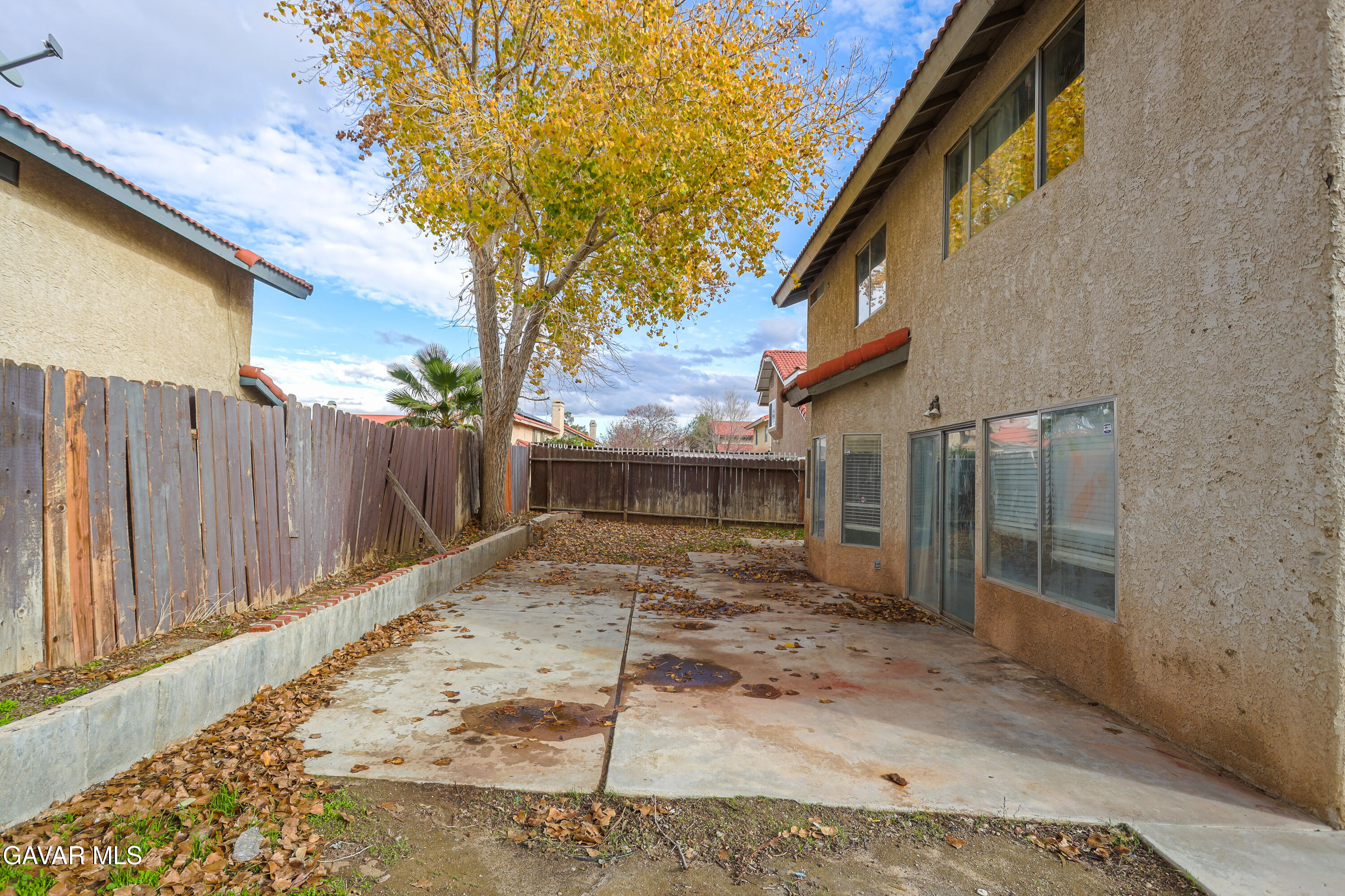 5217 East Ave R 4 Palmdale, CA 93552 - Photo 26 of 33 a view of a entrance gate of a house