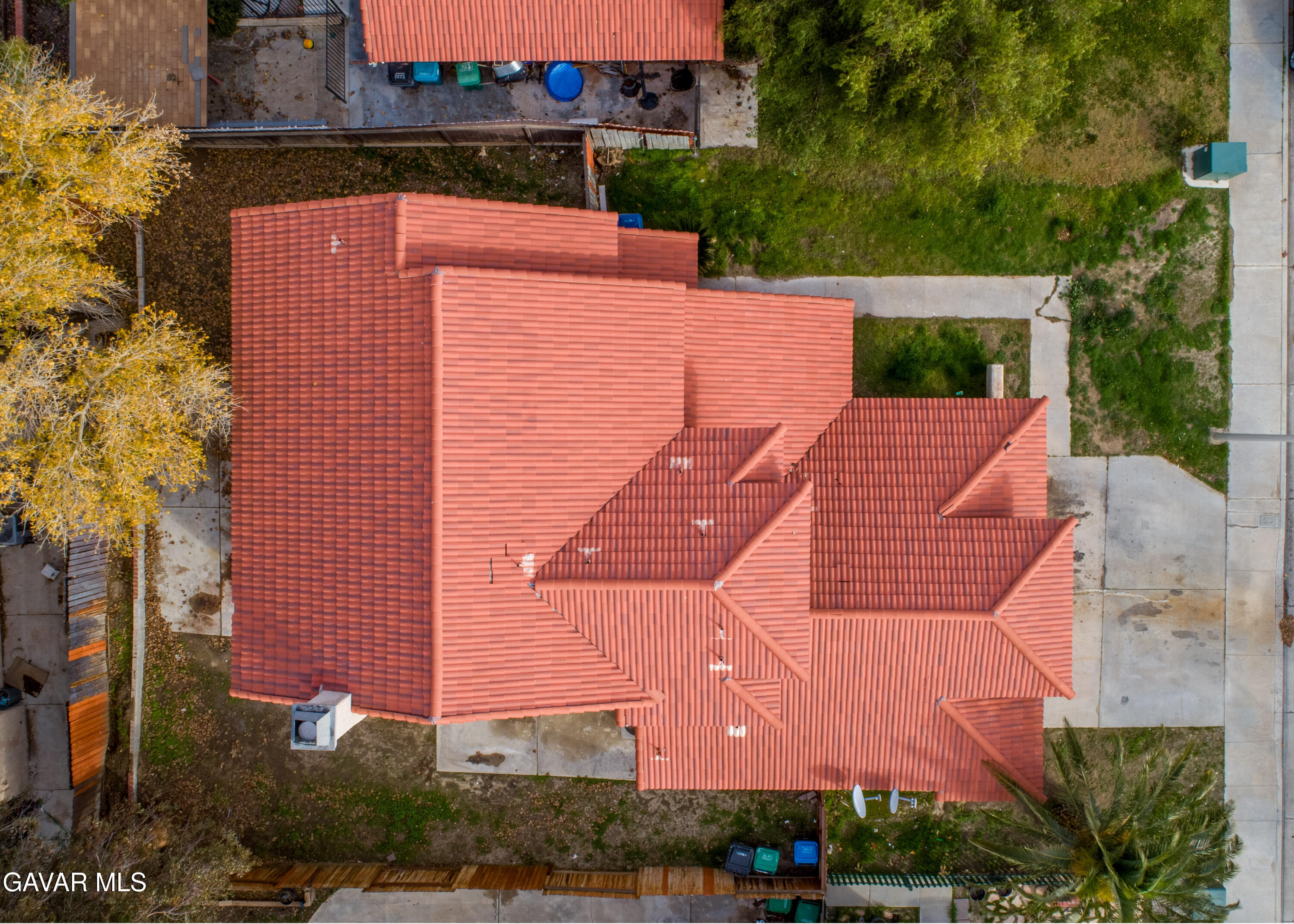 5217 East Ave R 4 Palmdale, CA 93552 - Photo 31 of 33 an aerial view of a house with yard and parking