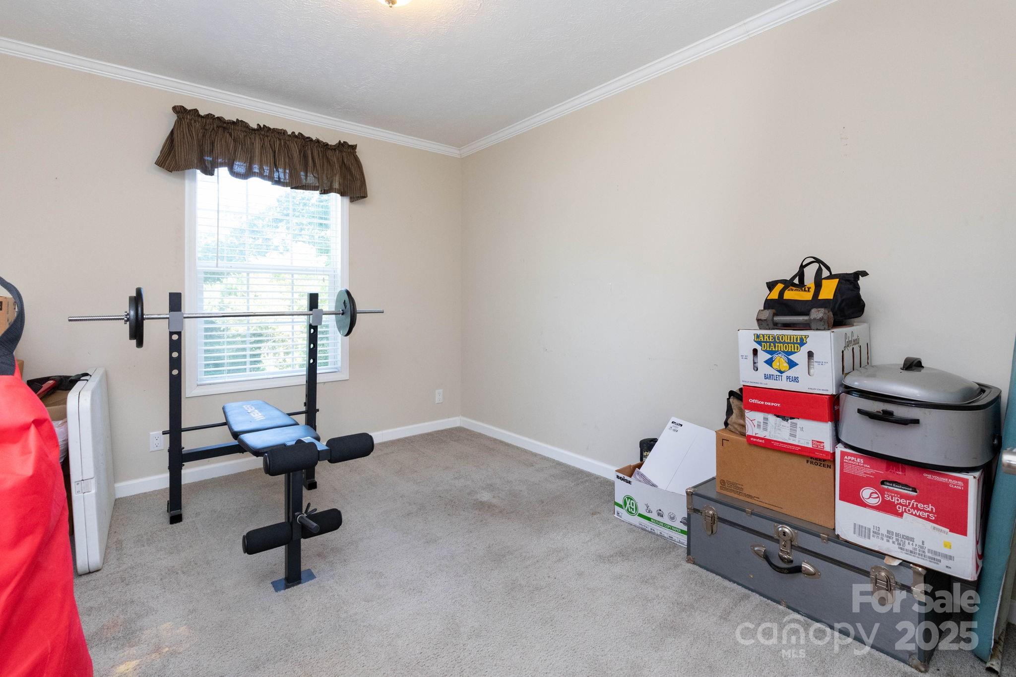 324 Lytle Cove Road Swannanoa, NC 28778 - Photo 21 of 27 a view of a workspace with furniture and a window