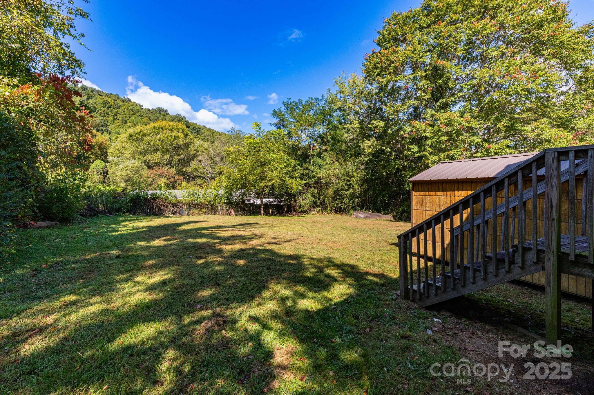 324 Lytle Cove Road Swannanoa, NC 28778 - Photo 24 of 27 a view of an outdoor space and yard