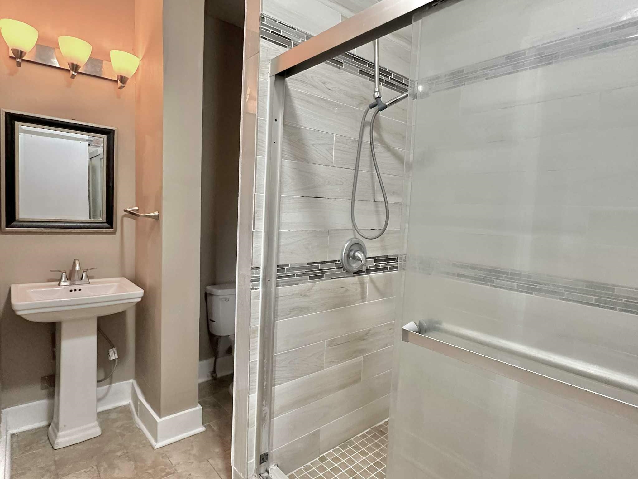 896 Orphanage Avenue Memphis, TN 38107 - Photo 13 of 17 Full bathroom with a stall shower