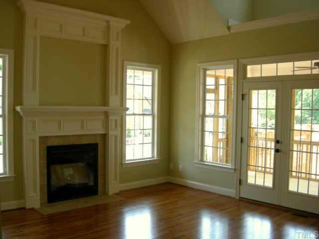 9341 Tabriz Point, Unit LT 29 Raleigh, NC 27614 - Photo 5 of 10 Family room with fireplace and door to wonderful screened porch Other