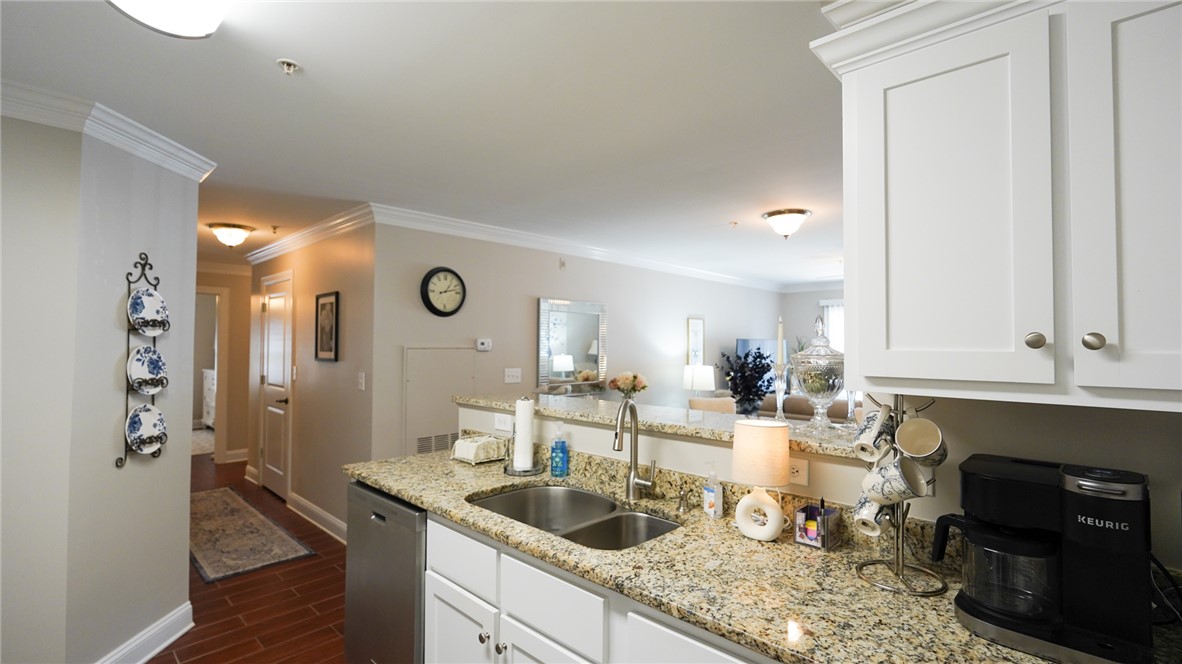 303 Lookover Drive Anderson, SC 29621 - Photo 12 of 46 This spacious kitchen offers ample counter space, ideal for culinary creations and entertaining.