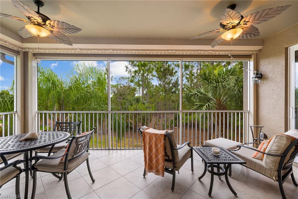 6669 Alden Woods Circle, Unit 7201 Naples, FL 34113 - Photo 26 of 28 a view of a chairs in balcony