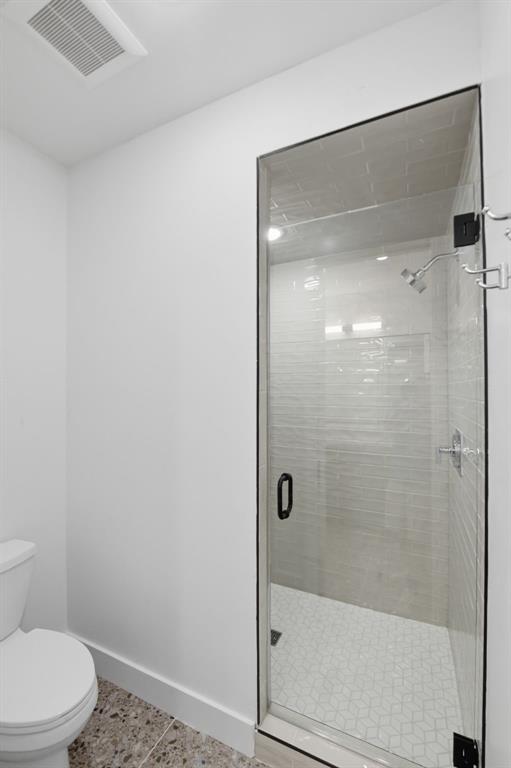 2025 Limestone Trail Graford, TX 76449 - Photo 14 of 33 a bathroom with a glass shower door
