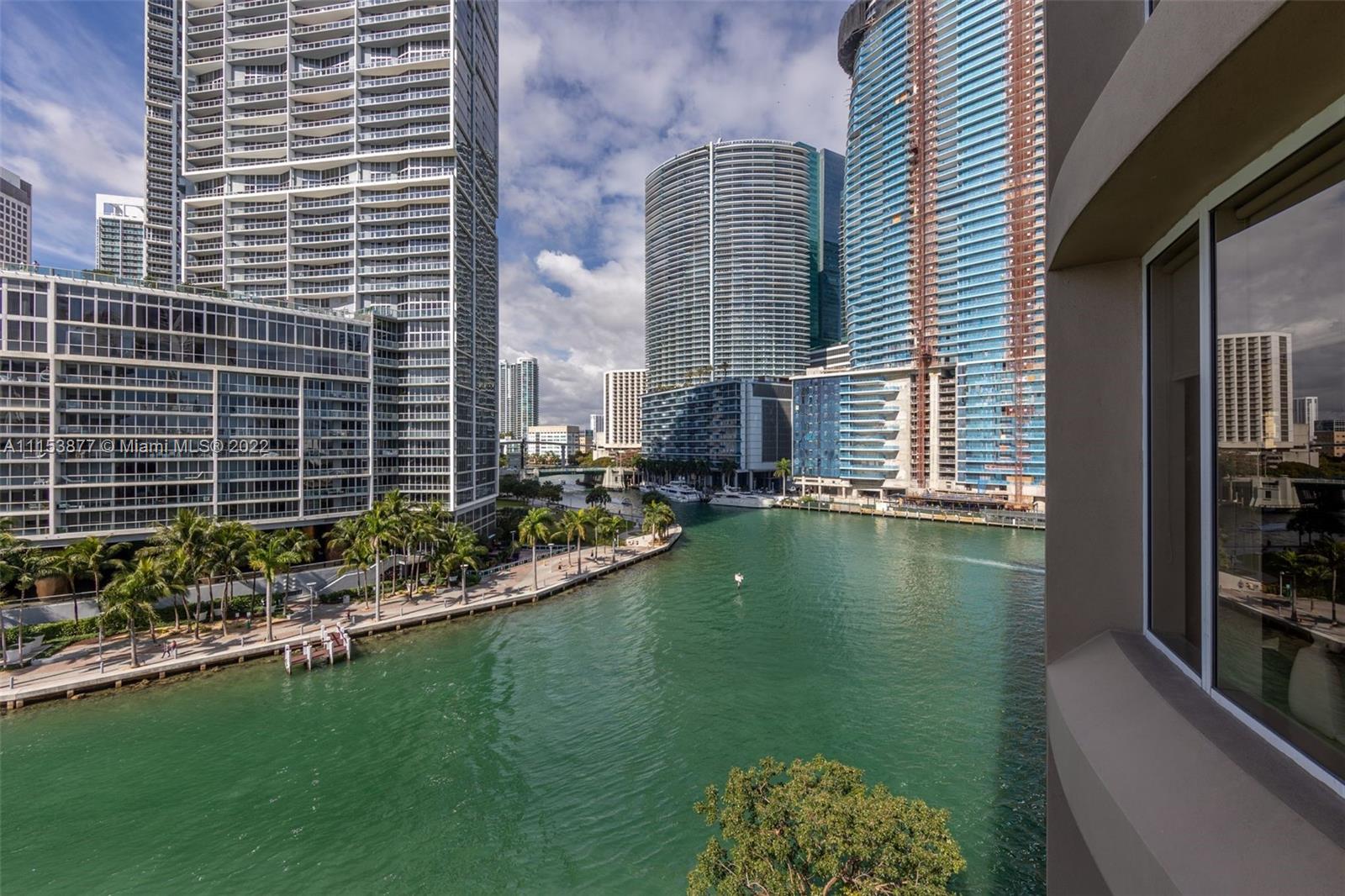 901 Brickell Key Boulevard, Unit 704 Miami, FL 33131 - Photo 16 of 39 a view of swimming pool from a balcony