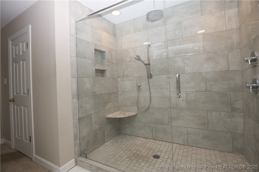 175 Knoll Road Southern Pines, NC 28387 - Photo 32 of 50 a bathroom with a shower