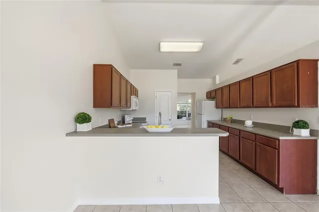 a view of a room that has a window in it