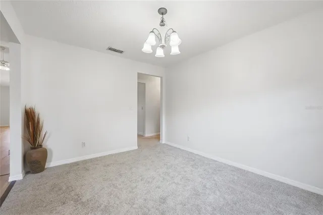 a kitchen with stainless steel appliances granite countertop a sink stove and microwave