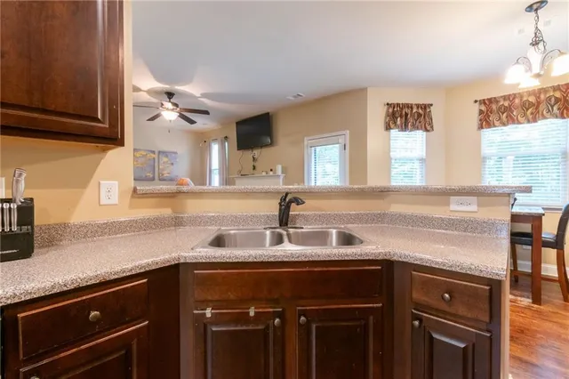 a kitchen with a sink and a cabinets